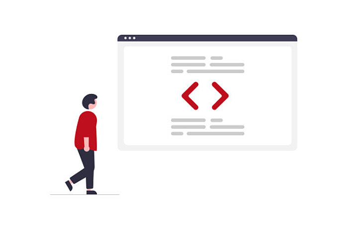 Mann schaut auf HTML-Code